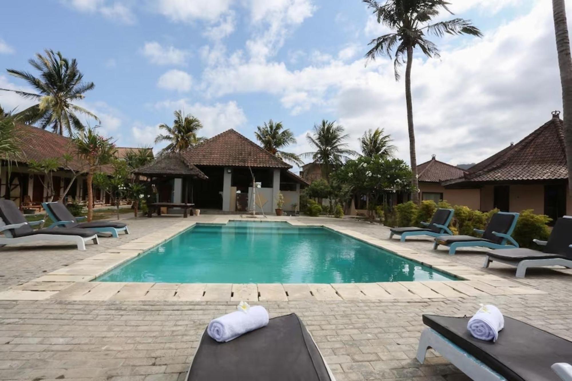 Gguesthouse Kuta  Экстерьер фото